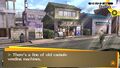 Protagonist looking at the capsule machines in Persona 4 Golden