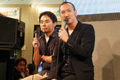A photograph of Kaneko and Kazuyuki Yamai at Tokyo Game Show 2003